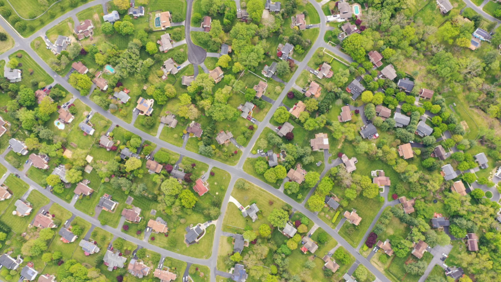 Aerial view of a leafy Maryland residential neighborhood where accessory dwelling units are built